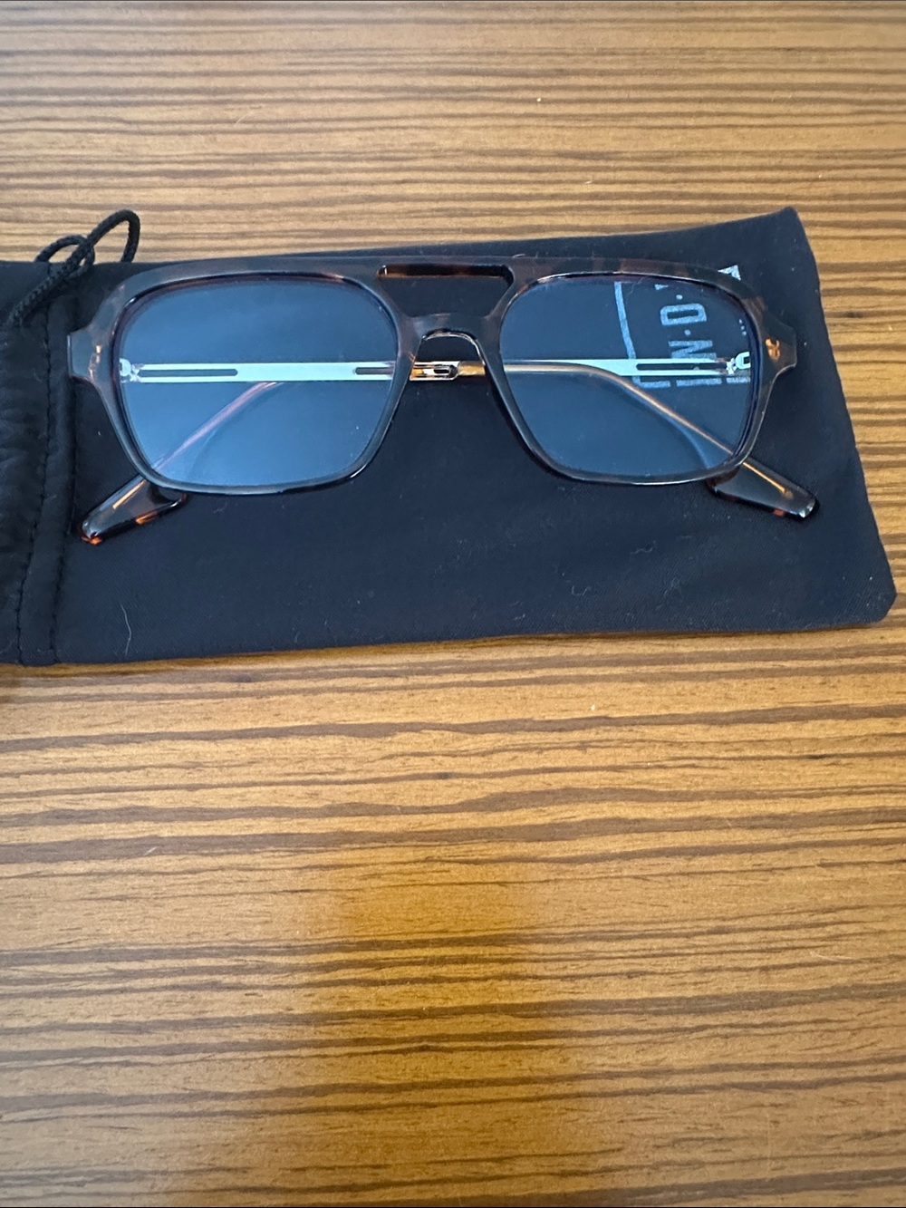 Indy MCF tortoise shell sunglasses with a light blue tint